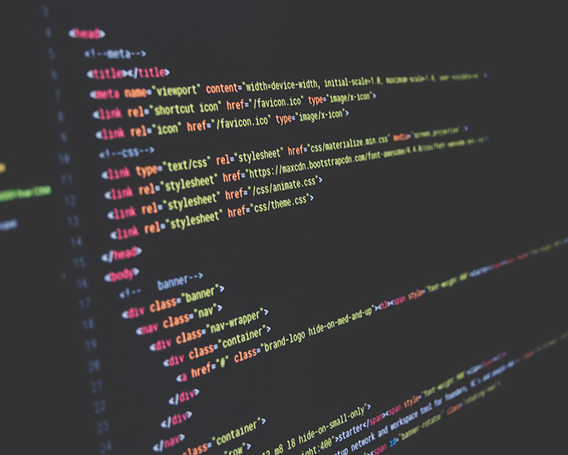 Computer screen showing HTML website code